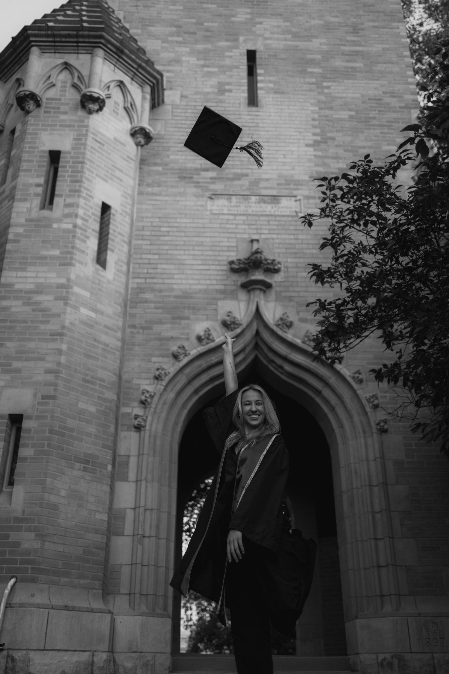 Black and white architectural photos showing stone archways and gothic details of a church exterior.