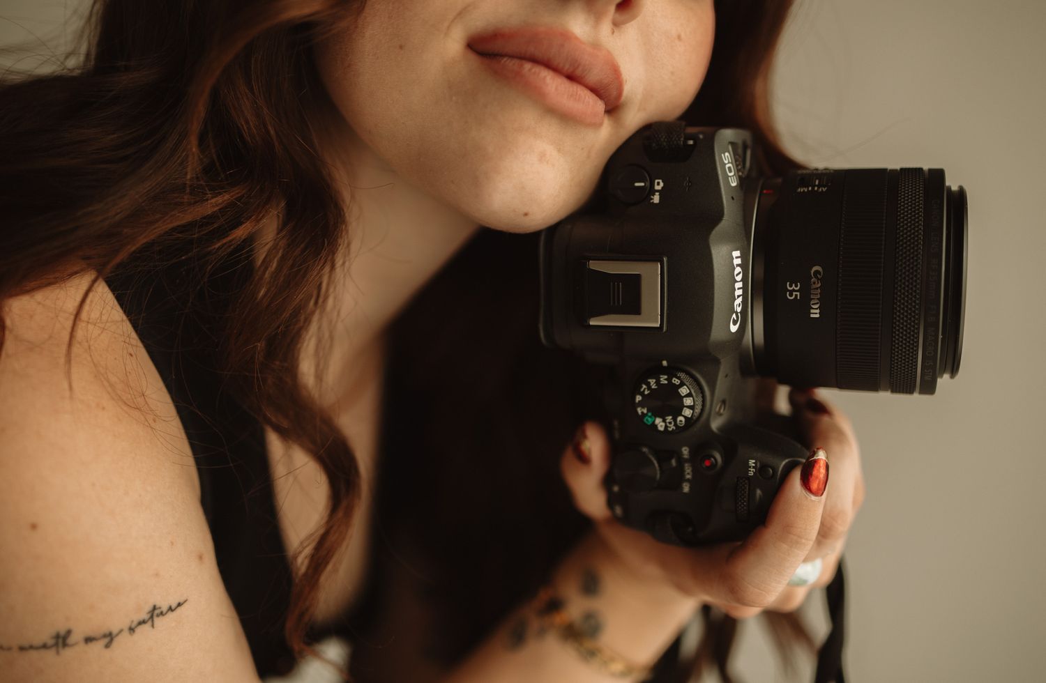 A series of six selfie photos showing dark hair and a camera in mirror reflections.