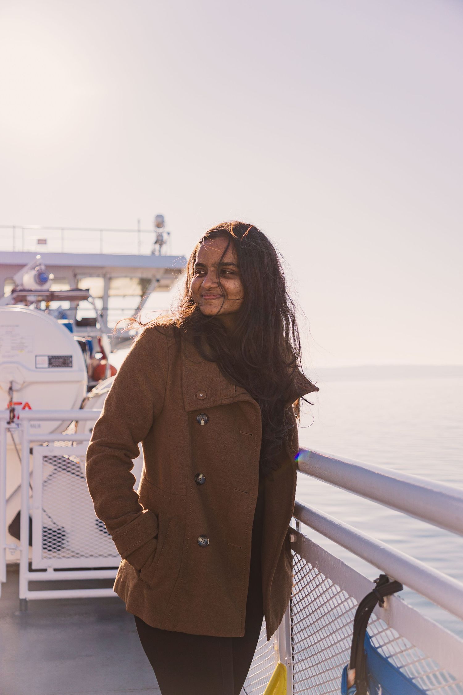 Candid portrait of woman laughing on BC Ferry deck between Victoria and Vancouver