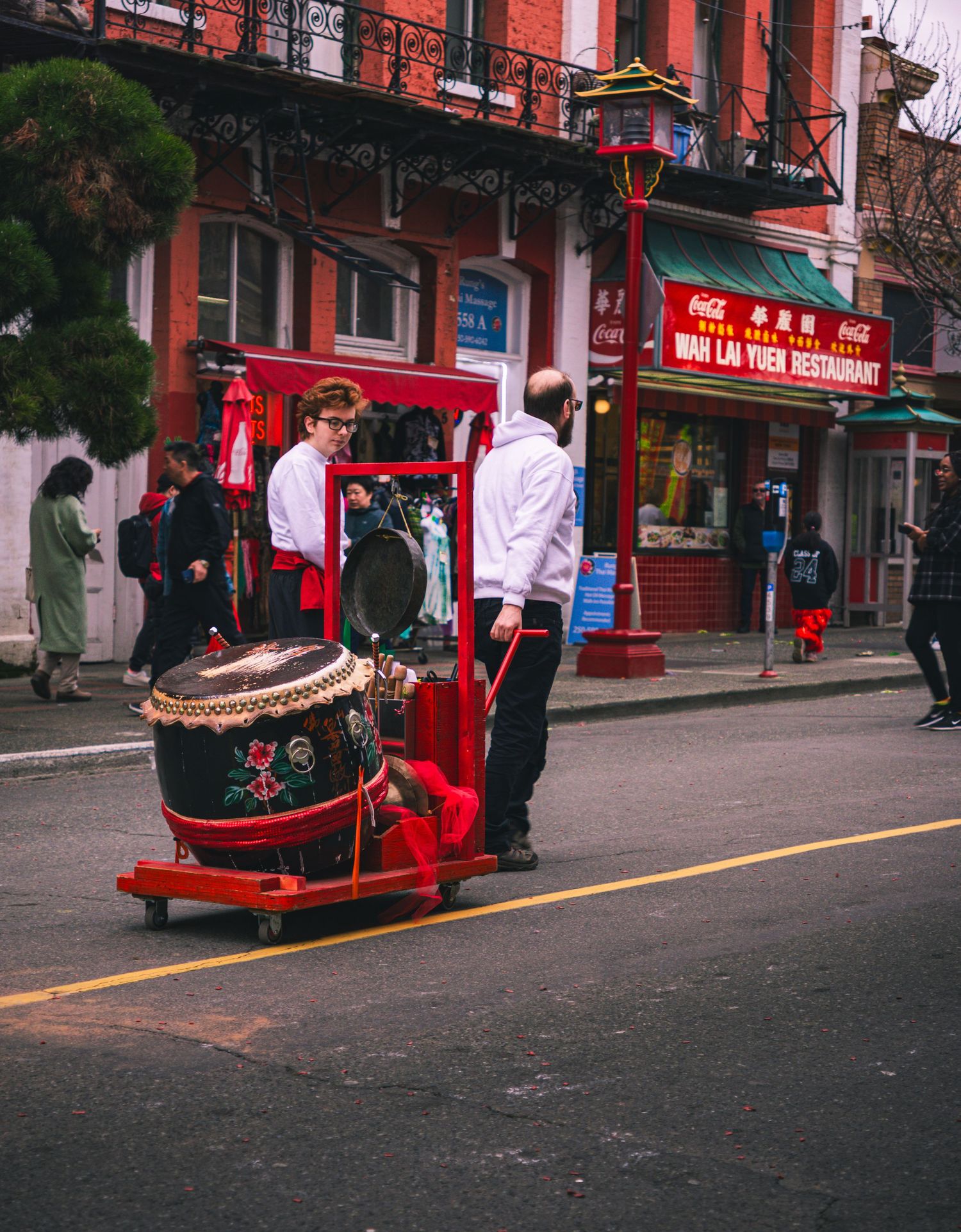 Performer preparing for lion dance at Chinatown event in British Columbia