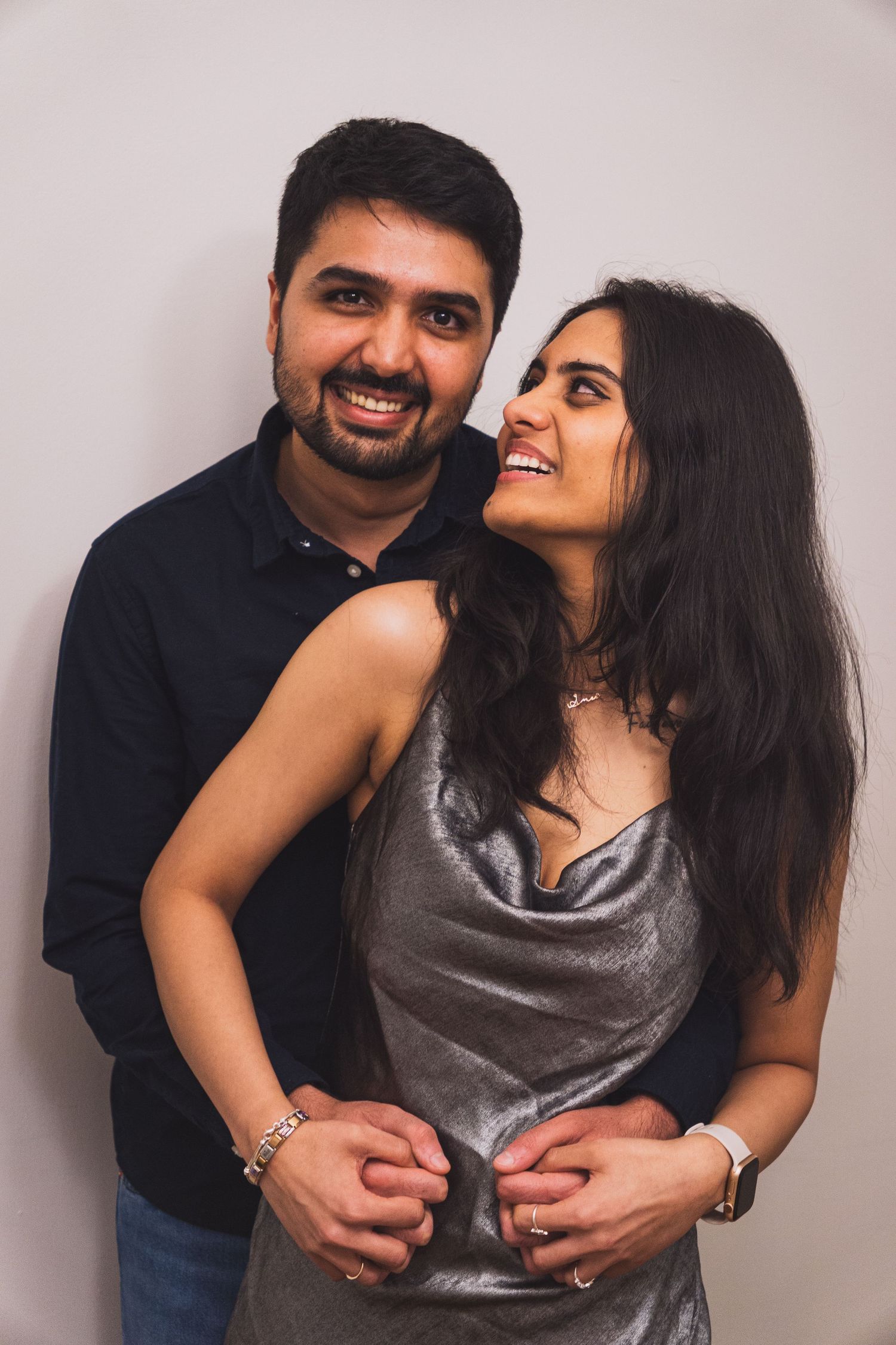 Authentic moment of couple posing during an in-home photo shoot in Vancouver, Canada