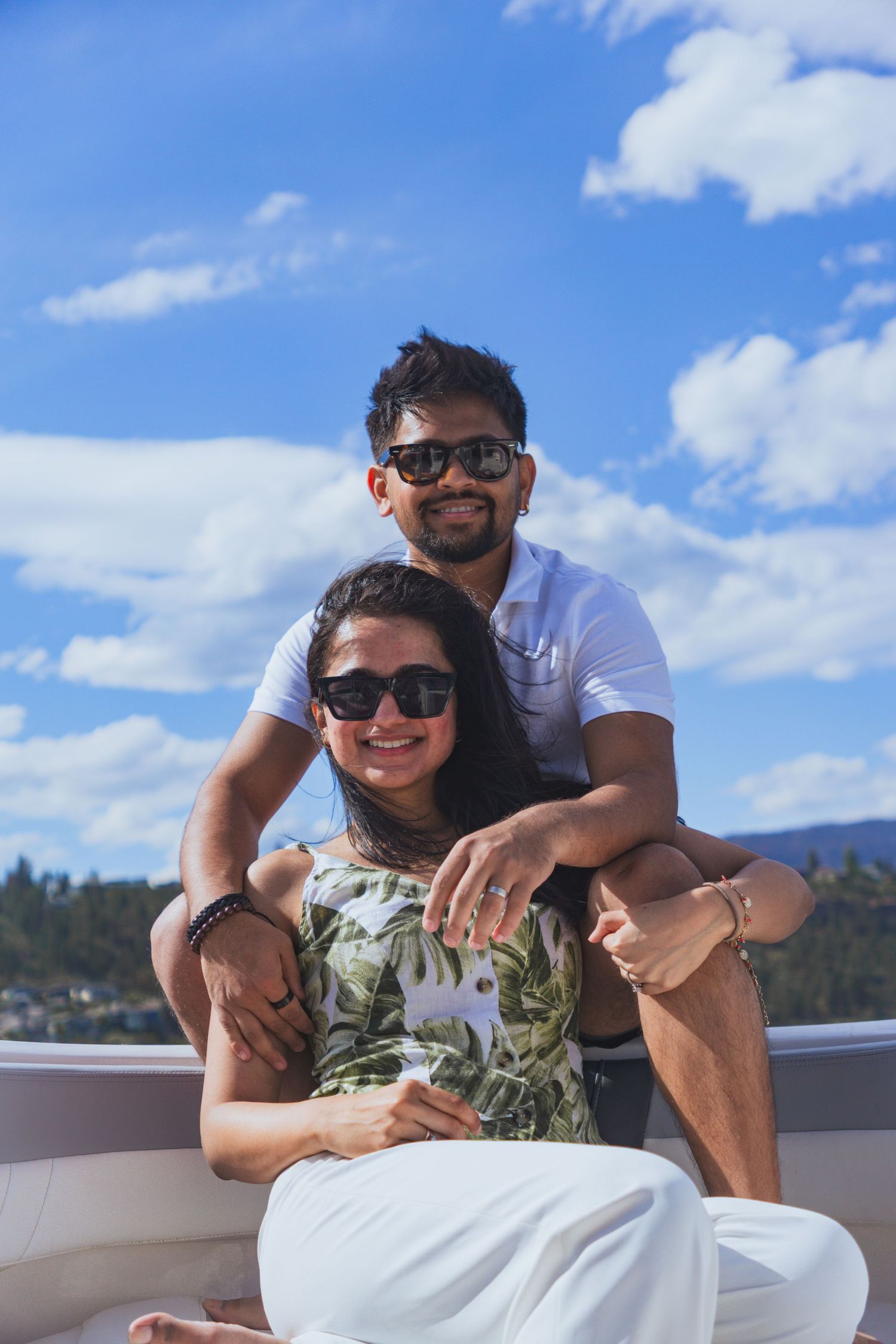 Natural couple shoot with sunlight on the boat in Kelowna, Canada