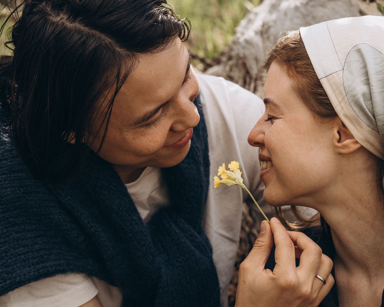 A romantic couple shares intimate close-up moments in a series of tender poses.