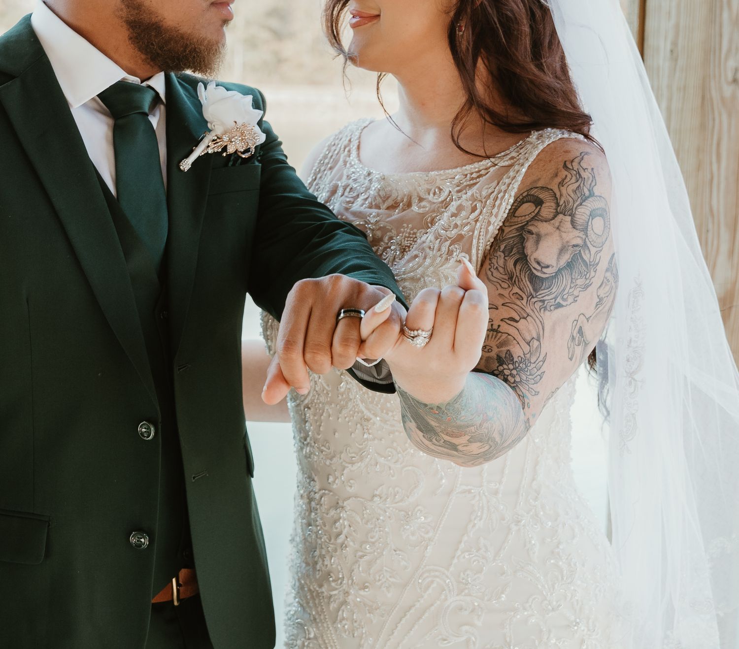 Romantic wedding couple shares tender moments in a series of intimate portraits against a light backdrop.