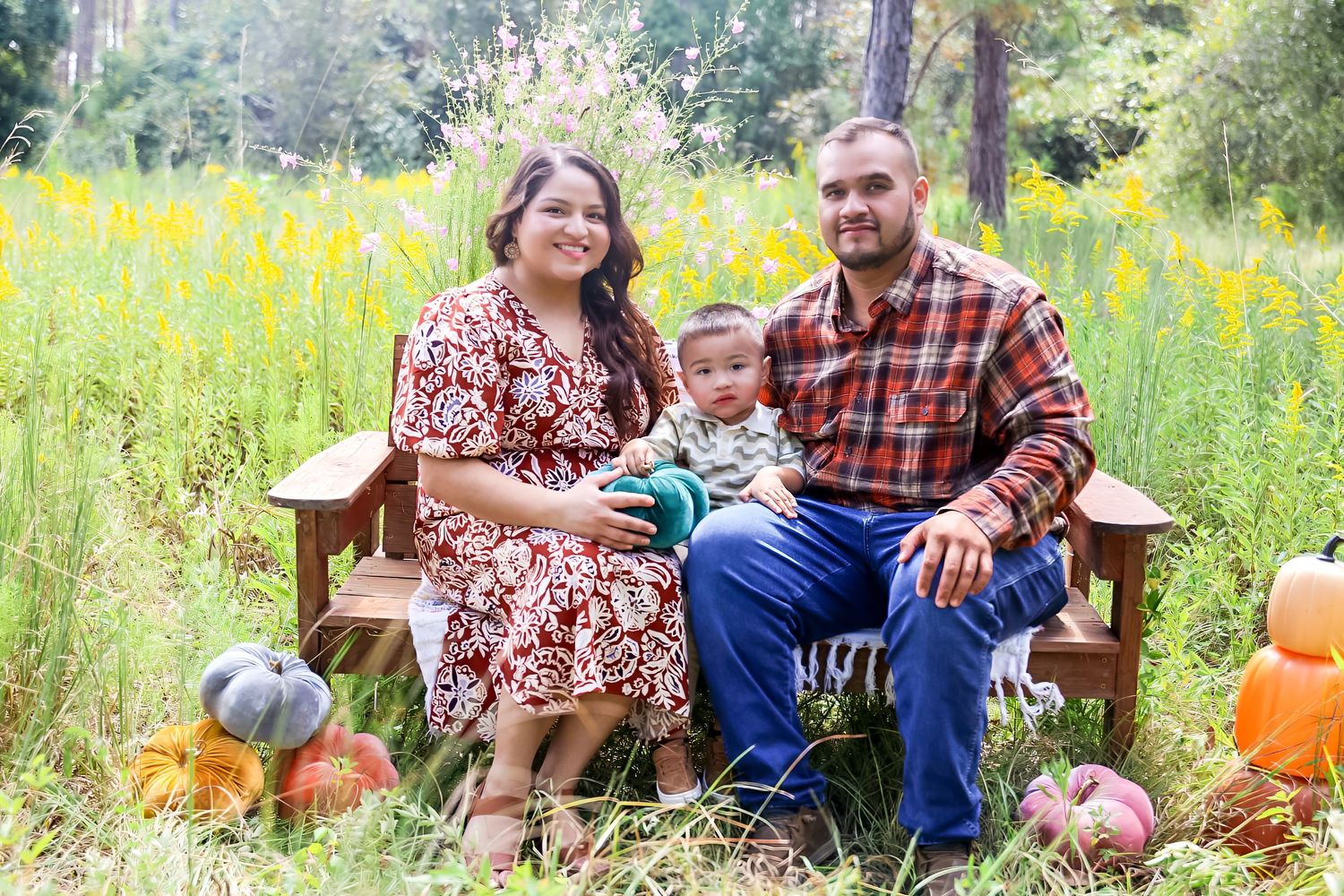 A series of outdoor autumn portraits on wooden benches with pumpkins and wildflowers in the background.