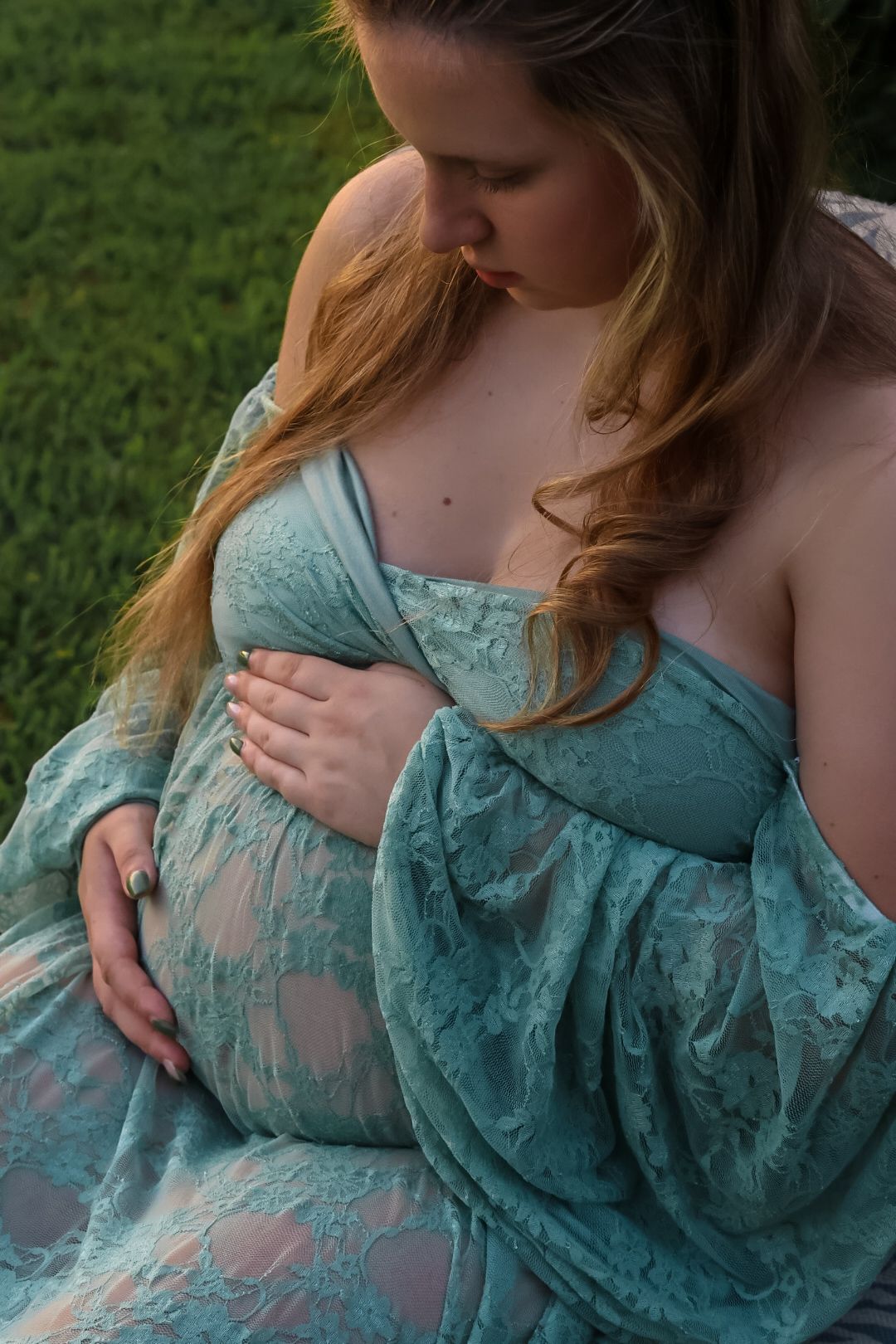 A series of photos showing someone wearing a delicate turquoise lace dress against a green outdoor background.