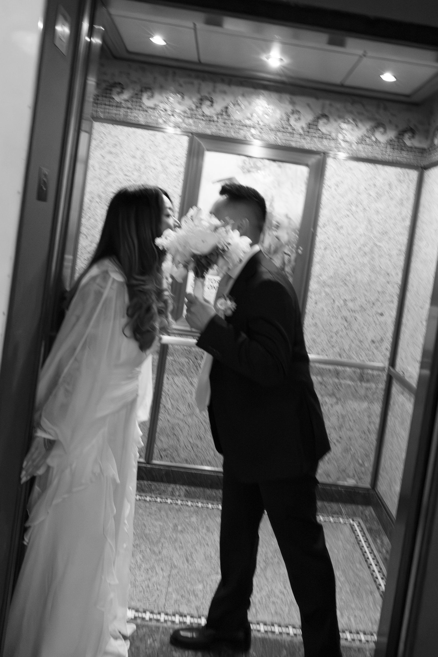 A black and white photo sequence shows a couple dancing in an elegant hallway during a wedding celebration.