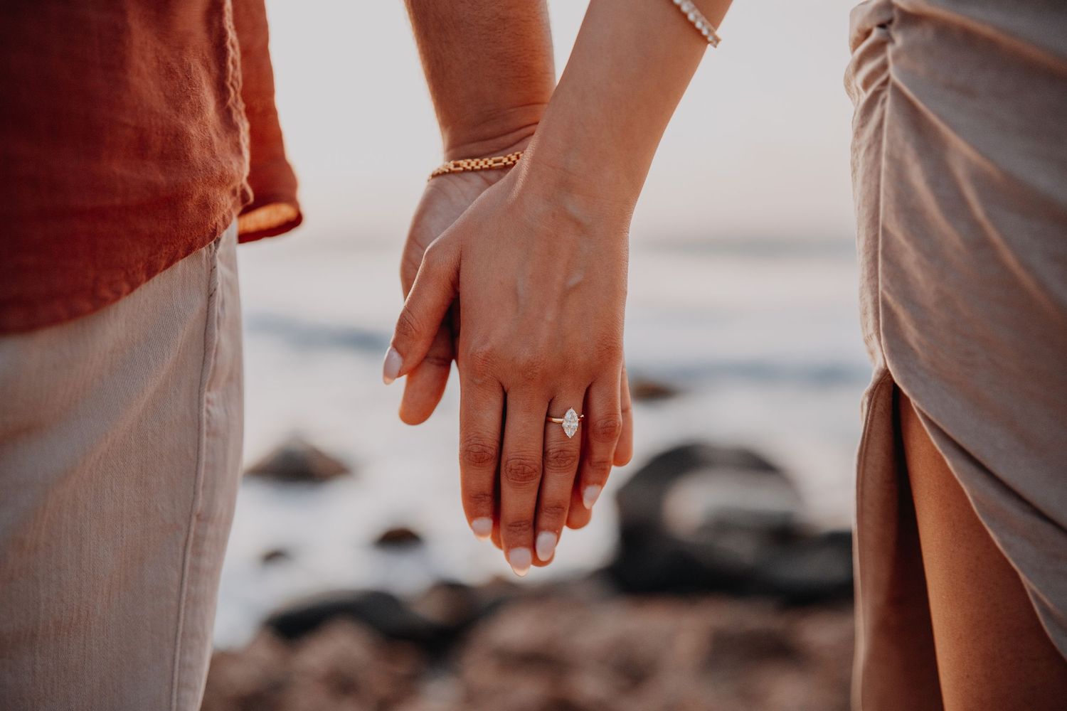Couple celebrating engagement after proposal session in Aruba
