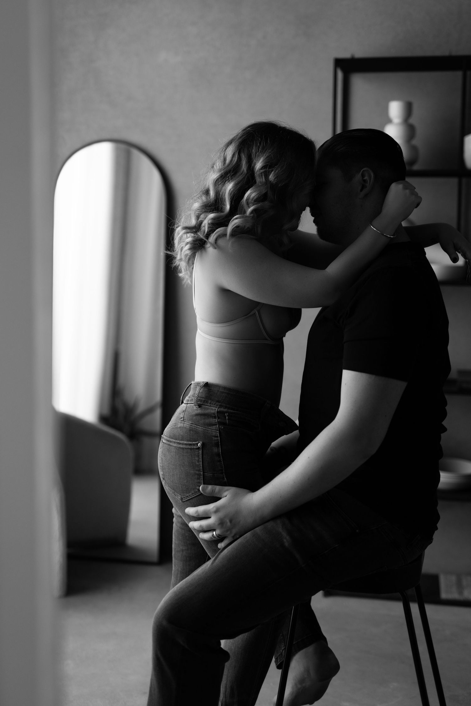 Black and white photo series showing intimate dance poses between two figures in silhouette against a window.