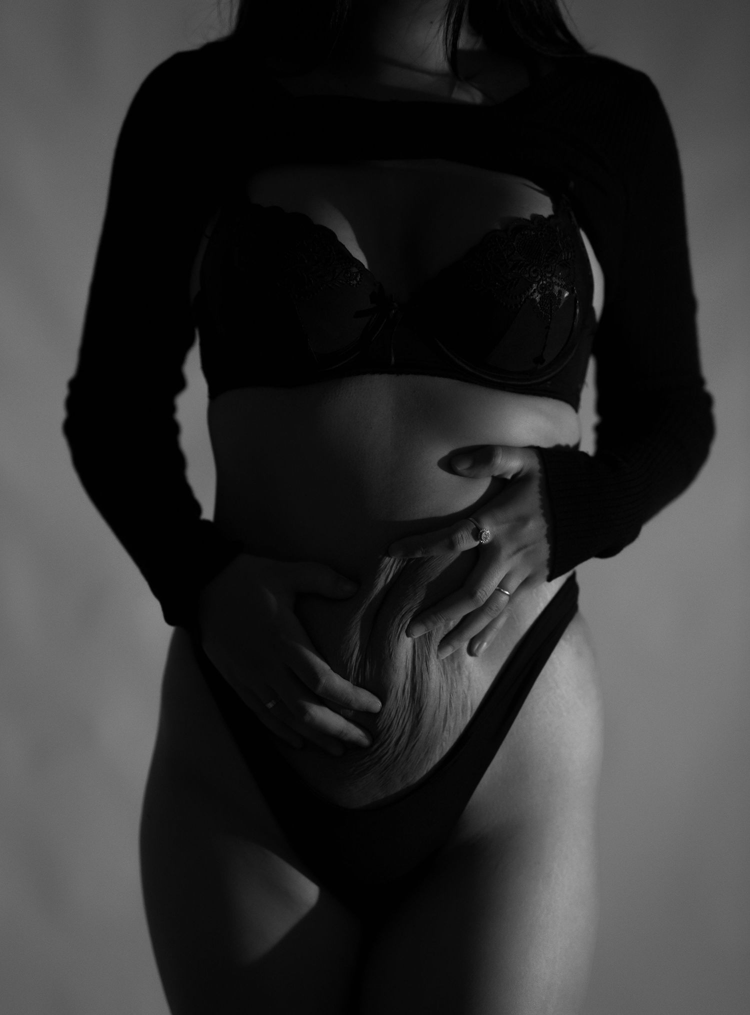 Artistic black and white portrait series showing silhouetted figures in dramatic shadows and lighting.
