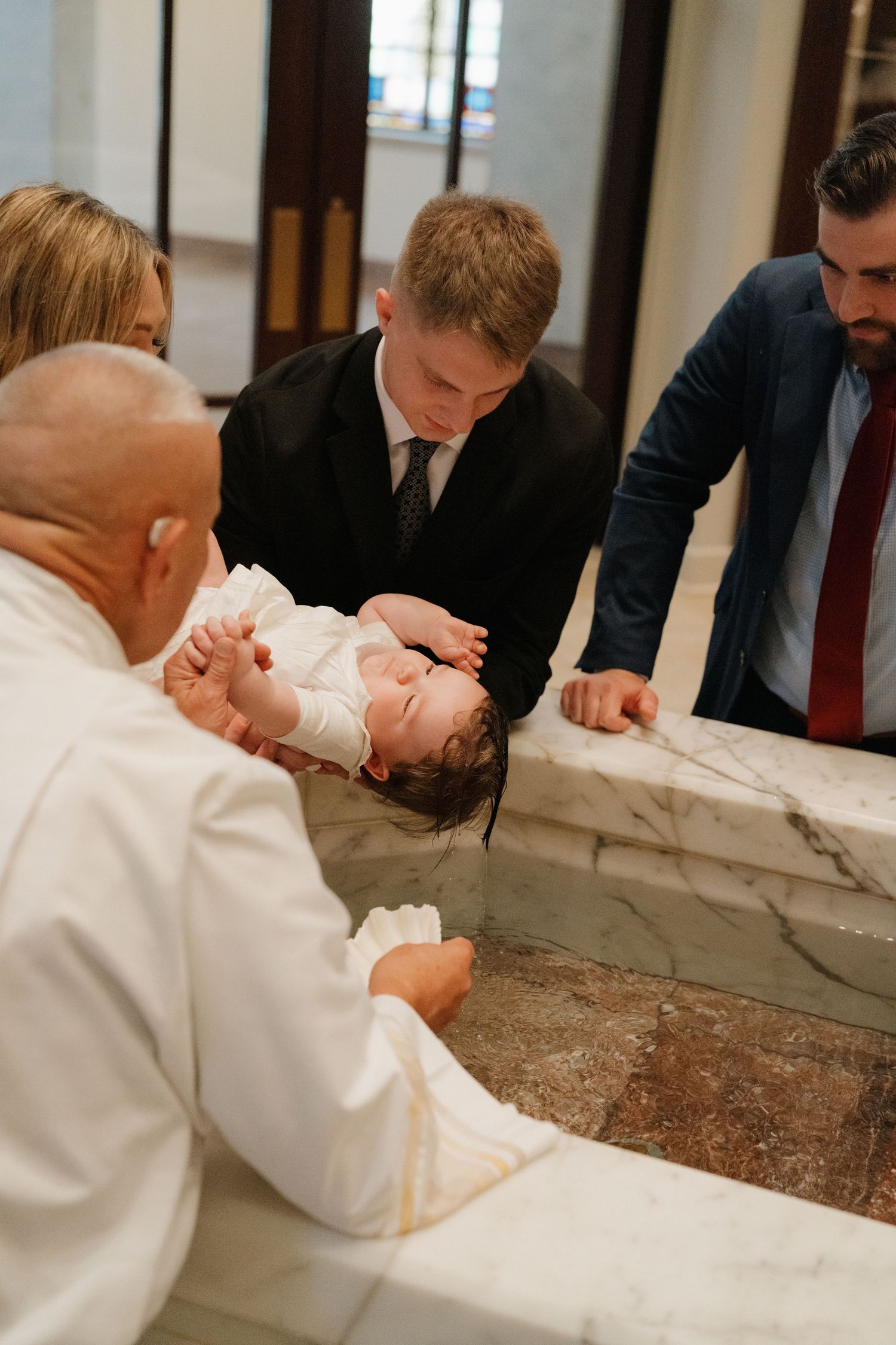 Catholic baptism photographer in Nashville