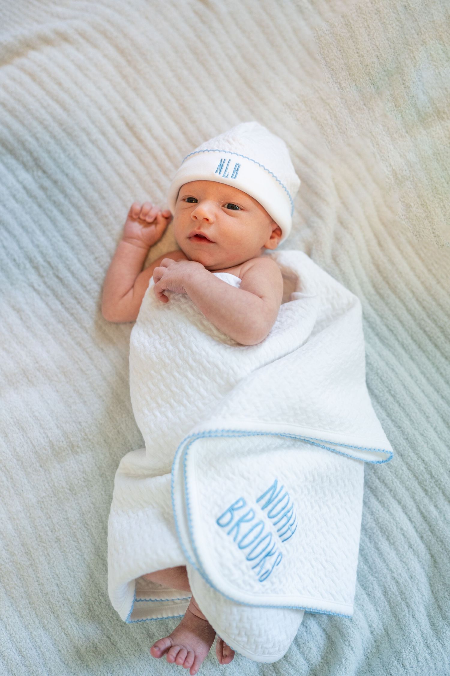 Newborn baby sleeping peacefully during lifestyle photography session