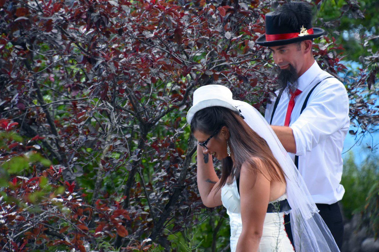 Couple holding hands after an intimate wedding ceremony in Niagara