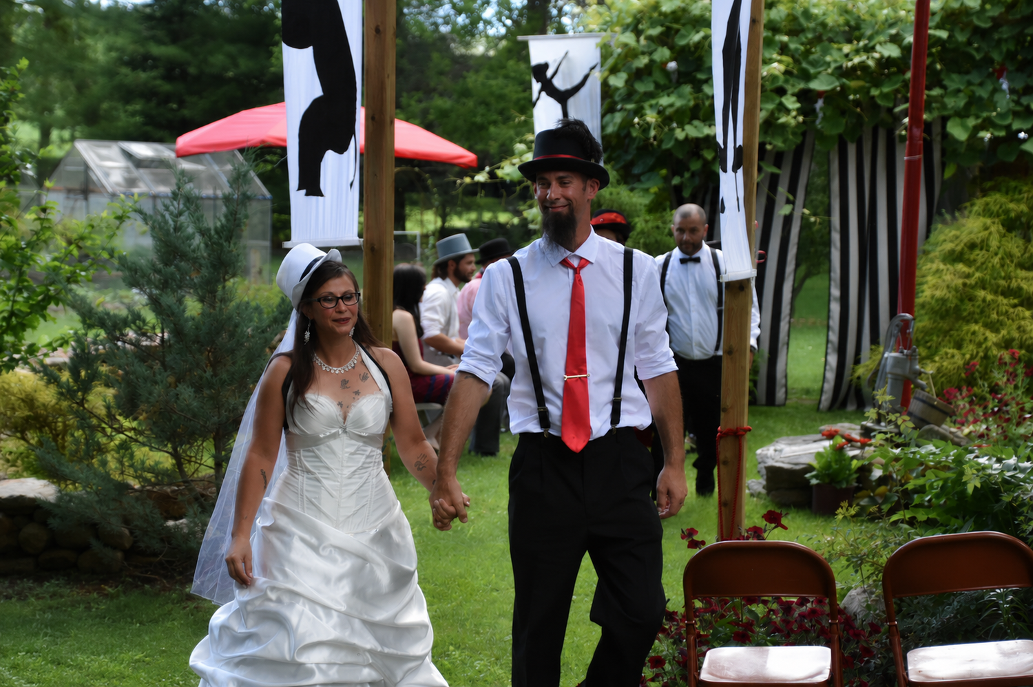 Bride and groom holding hands after an intimate wedding ceremony in Niagara