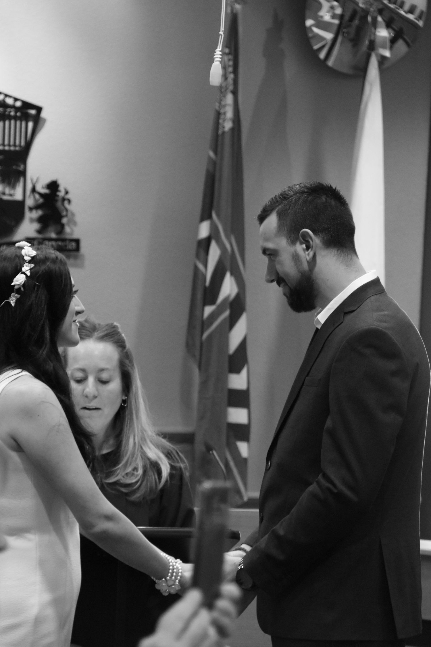 Bride and groom exchanging vows at intimate elopement ceremony at Niagara Falls City Hall