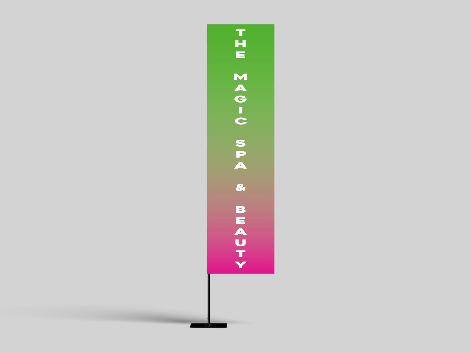 Tall feather flag banner with gradient green to pink design reading The Magic Spa and Beauty.