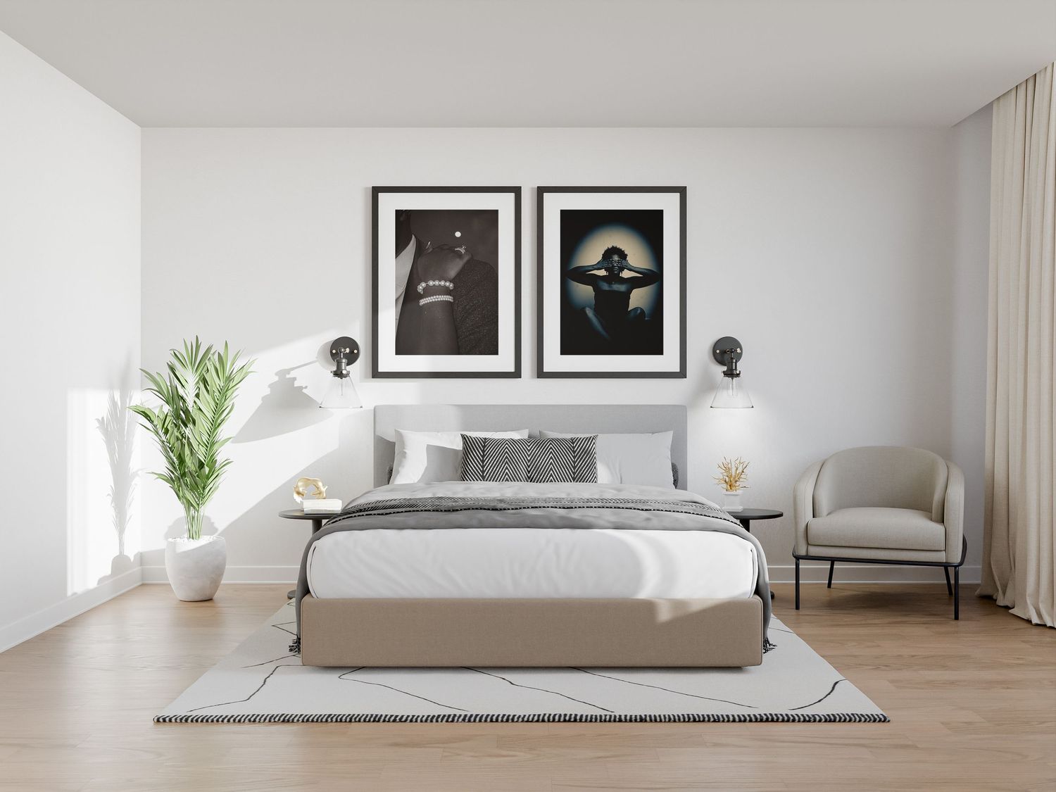 Modern bedroom featuring two framed dark artistic portrait photographs above a minimalist bed.