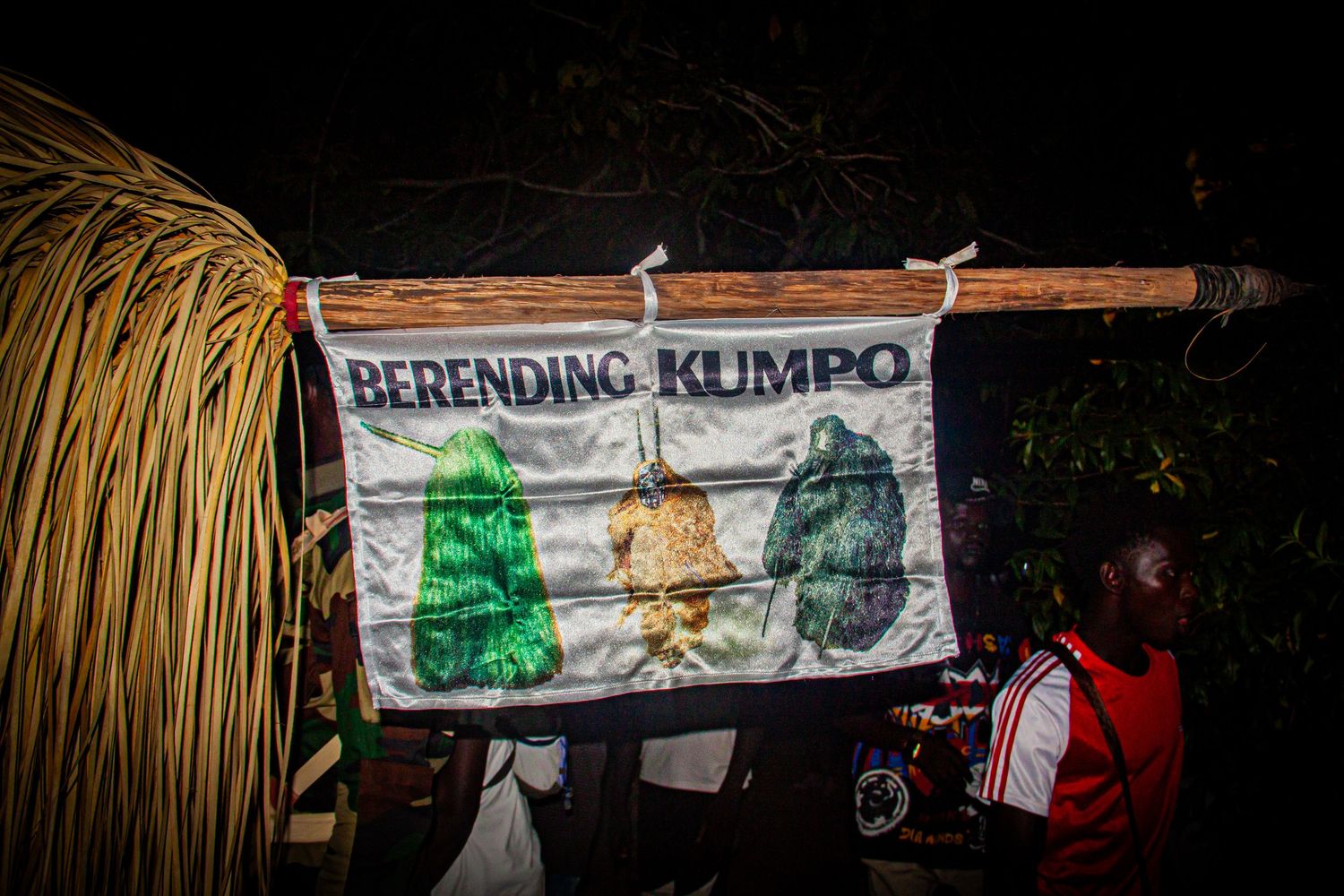 Berending Kumpo festival flag displayed at a traditional African night ceremony.