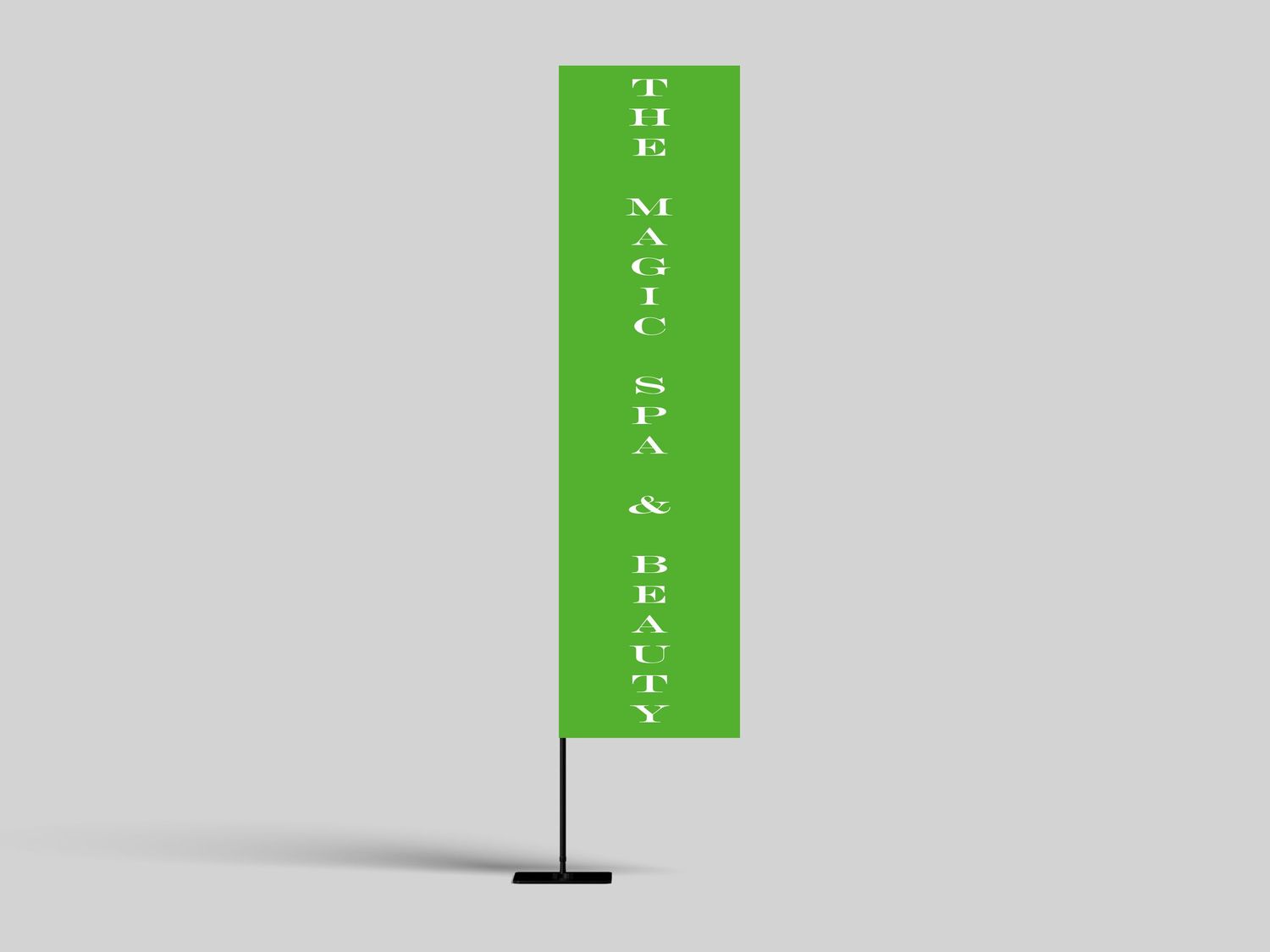 Green rectangular feather flag banner displaying The Magic Spa and Beauty in white text.