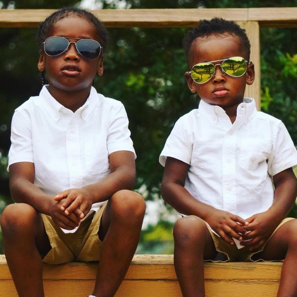 2 children with shades