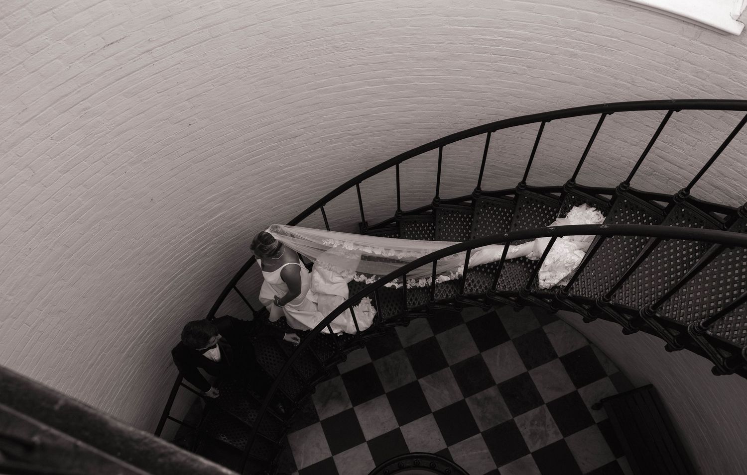 Bride and Groom on staircase in Saint Augustine, Florida.