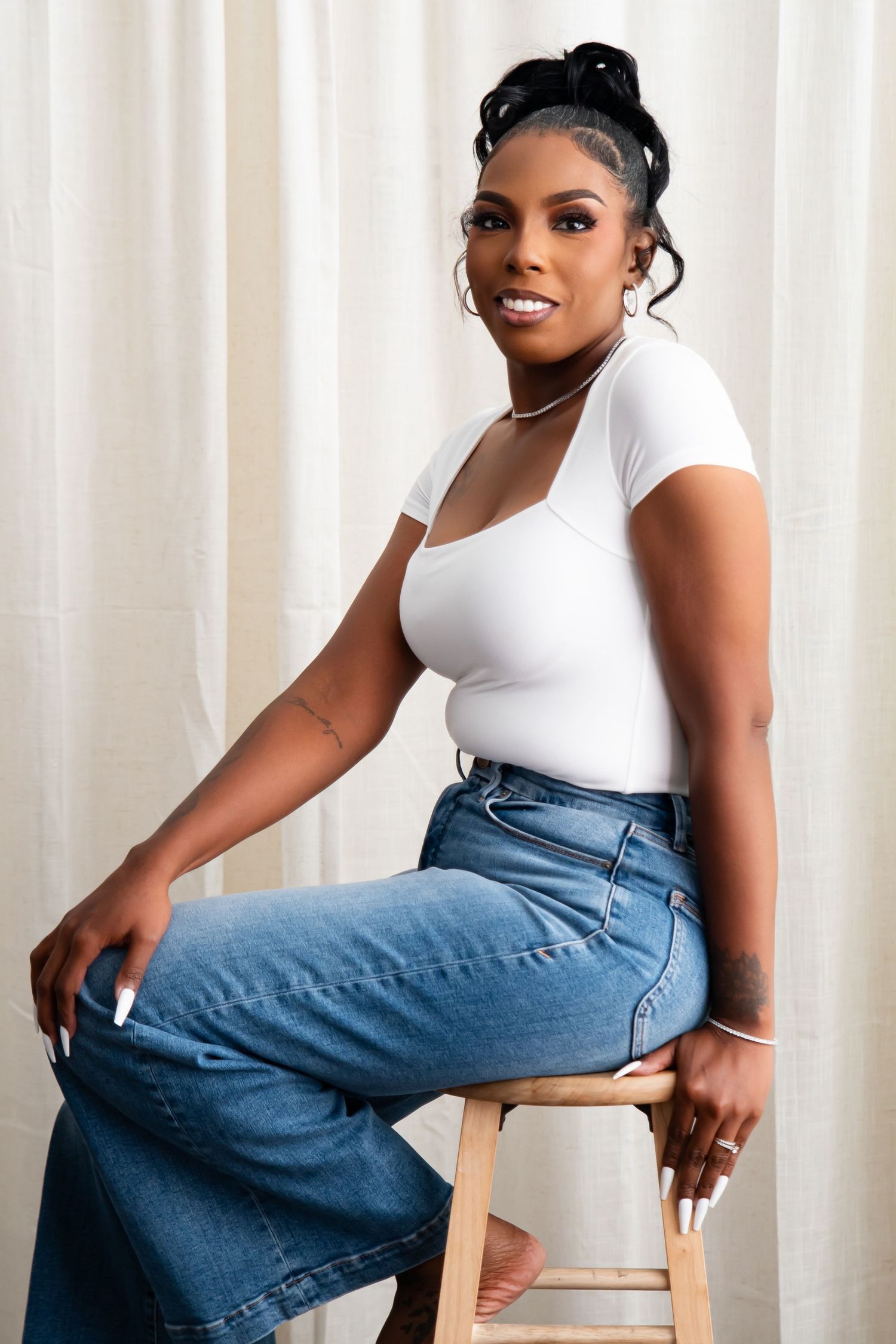 Casual fashion portraits featuring denim and white basics against light background.