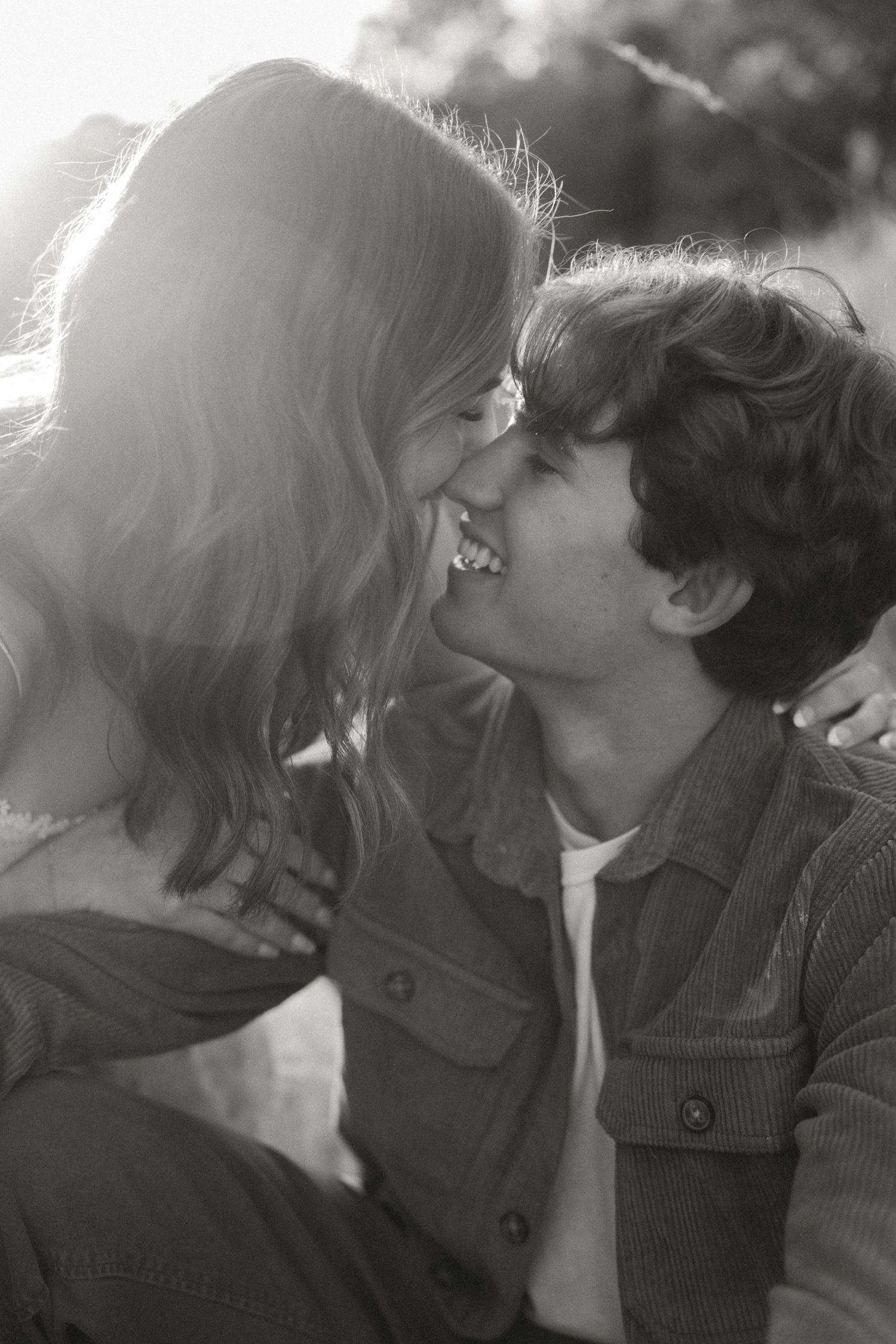 Romantic black and white photo sequence capturing an intimate moment between two people.