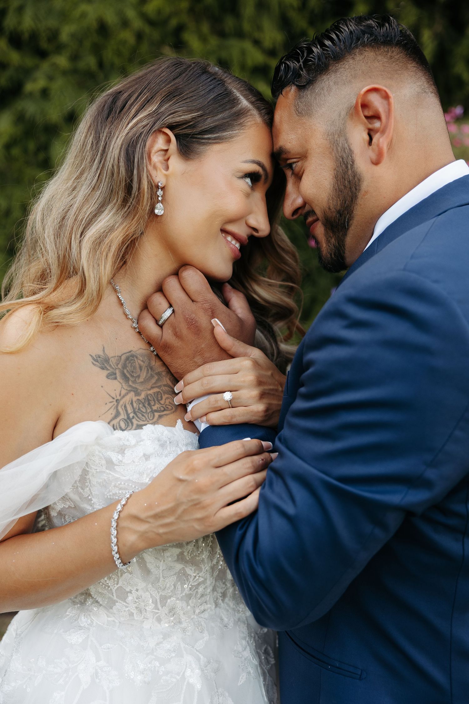 Intimate wedding couple portraits showing tender moments in formal attire.