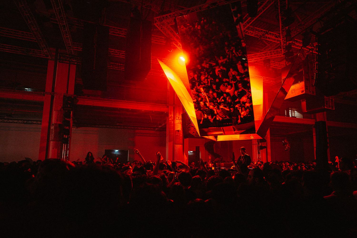 Vibing crowd at La Sucrière during Nuits Sonores 2023