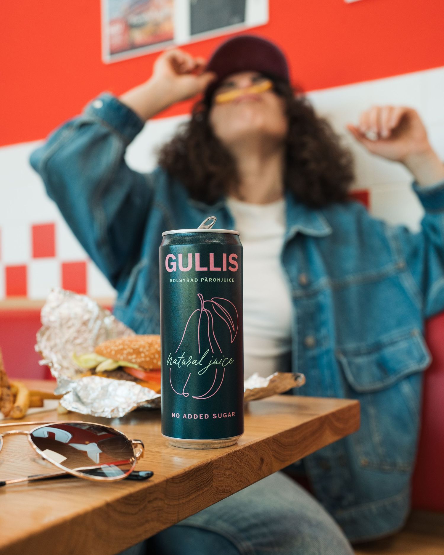 Lifestyle product photography for Gullis drinks brand shot in a retro diner in Stockholm