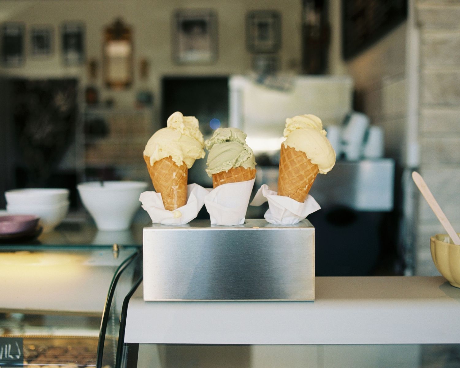 3 ice creams on a countertop photographed on film for content creation for restaurants
