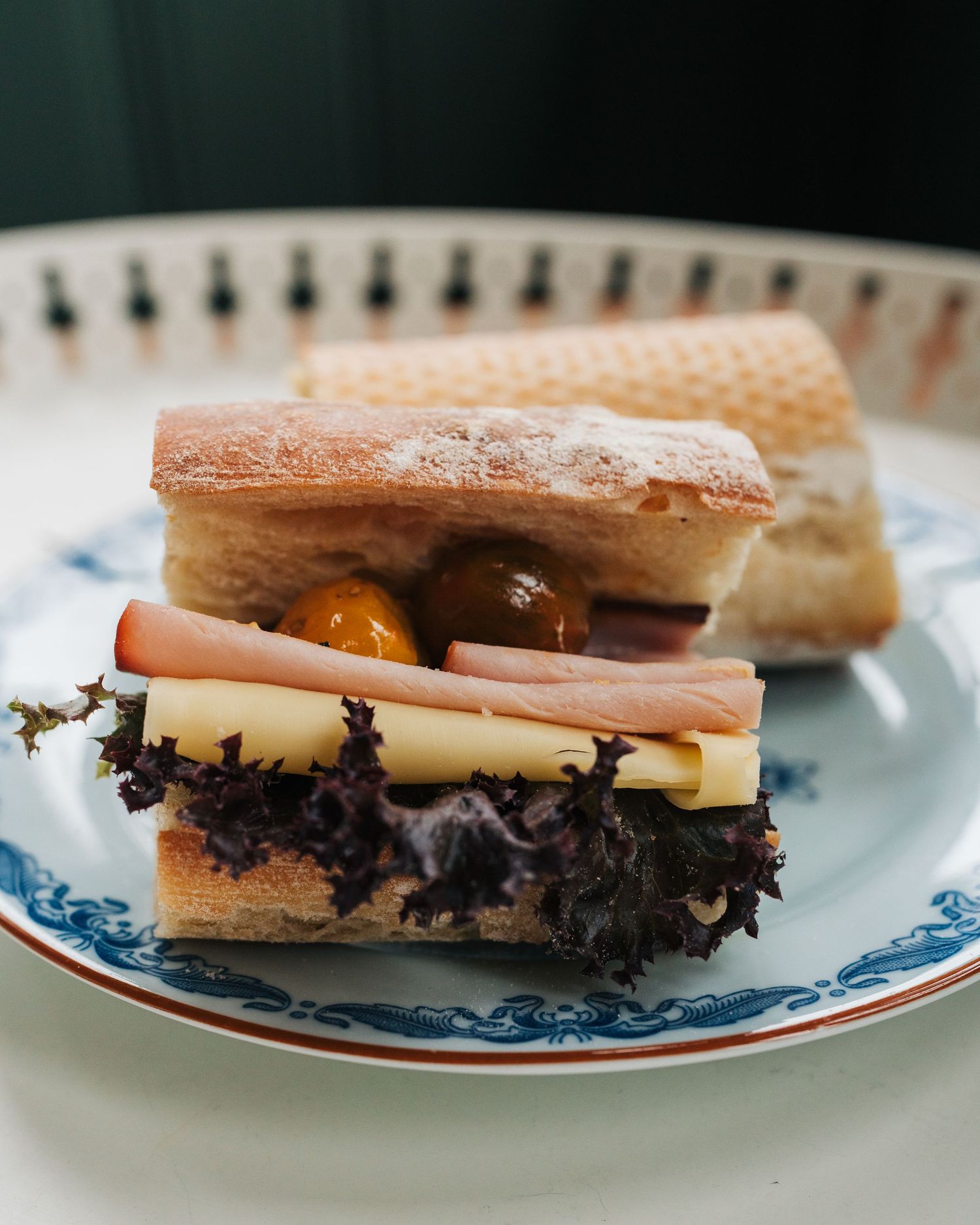 homemade sanwhich on a table in a cafe for fika for a lifestyle photoshoot for cafes