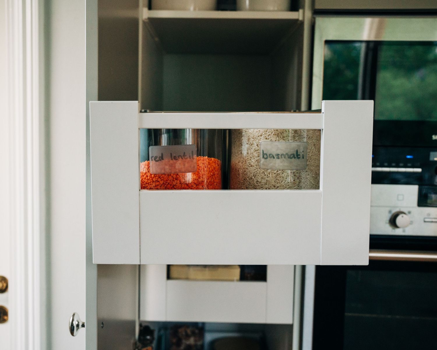 spices in jars in a cupboard at home photographed for a commercial shoot in Stockholm, Sweden