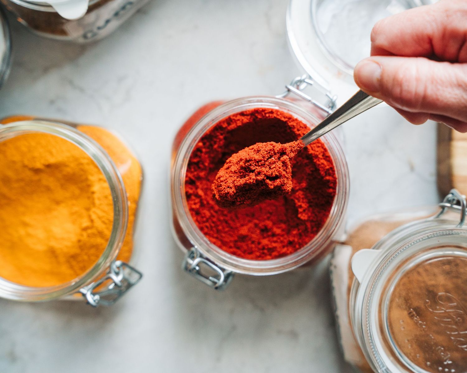 spices in jars on a countertop for a commercial food photography shoot in Stockholm, Sweden