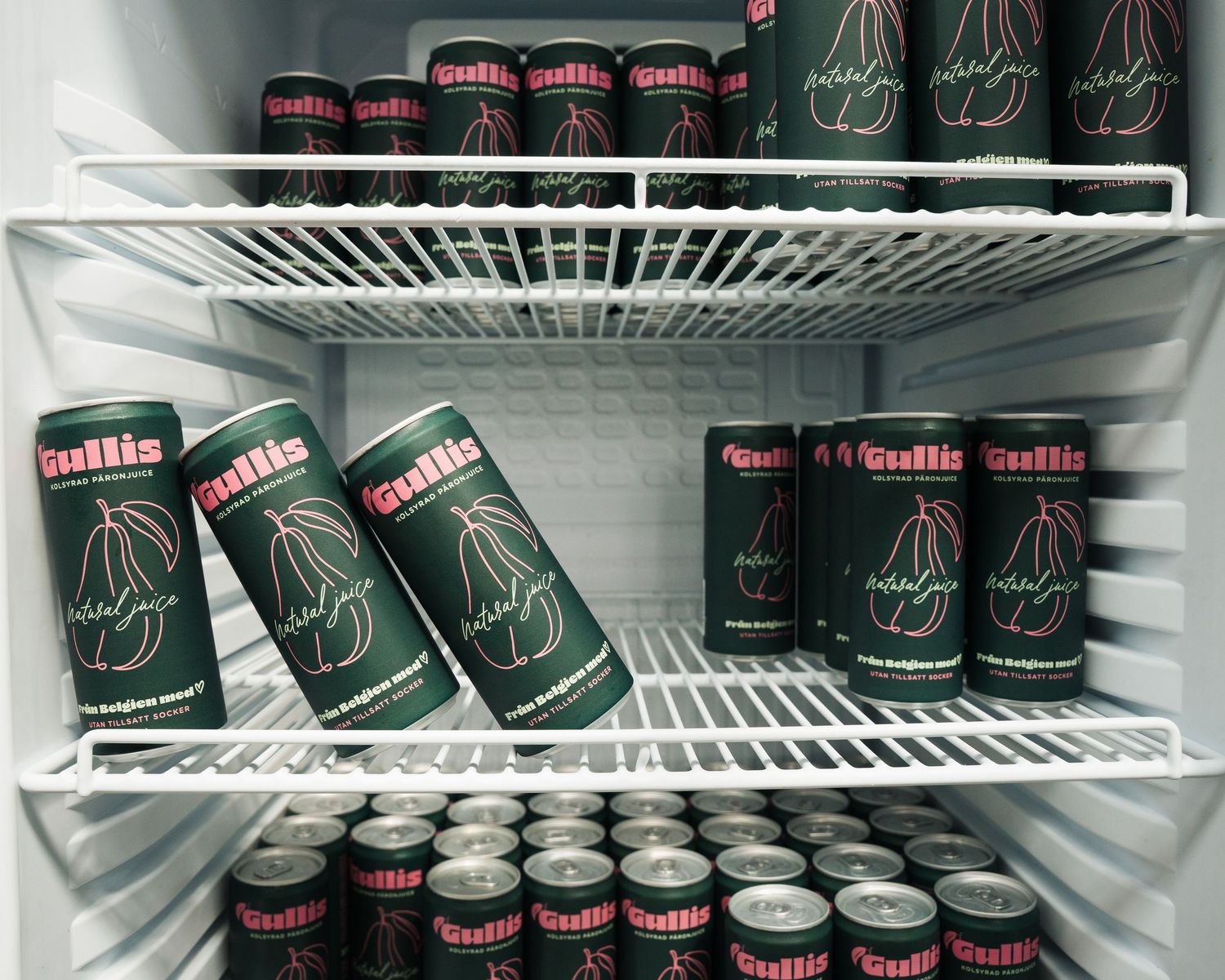 fridge full of Gullis pear drink at a vintage market in Stockholm, Sweden. Event photography for Brands in Stockholm, Sweden