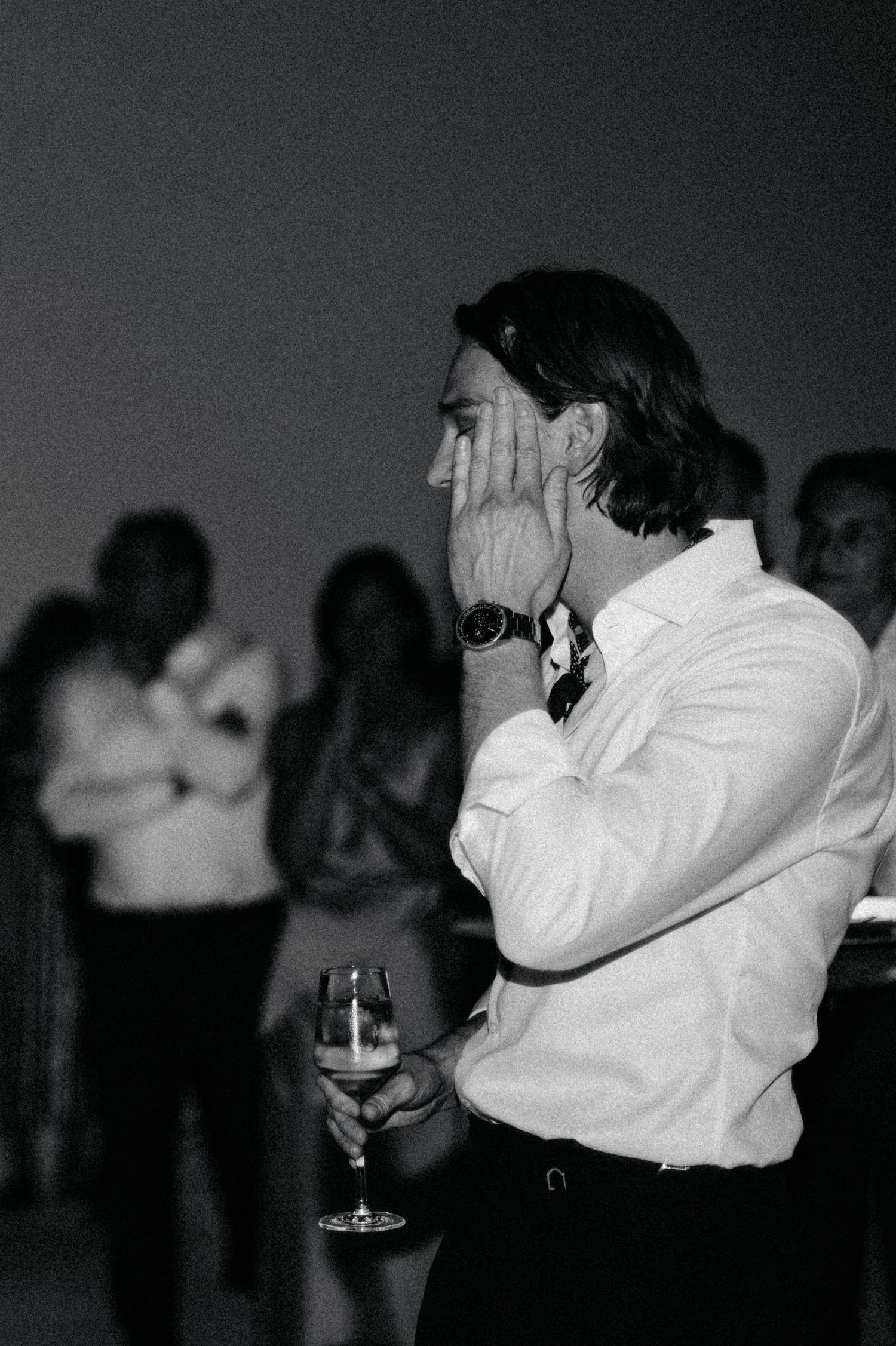 A black and white photo sequence shows a person drinking from a glass in multiple frames.
