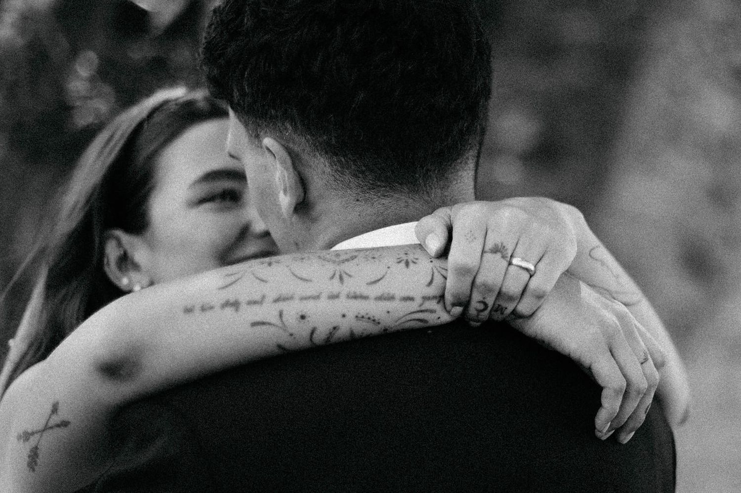 A black and white collage of romantic couples kissing and embracing in intimate moments.