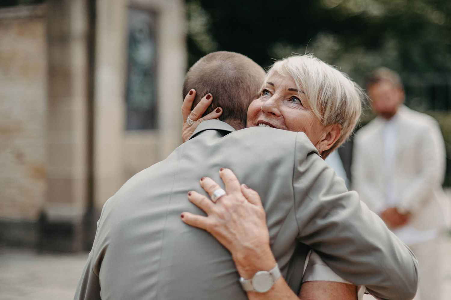 Wedding celebration sequence showing joyful moments between guests and newlyweds.