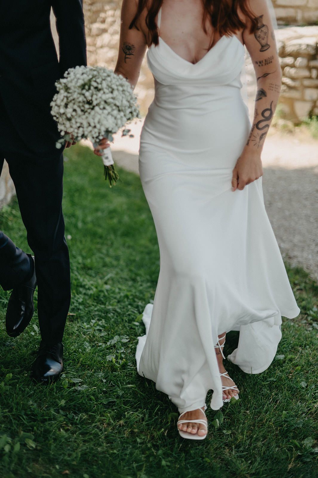 Series of photos showing the bottom of a white wedding dress and shoes on grass during an outdoor ceremony.