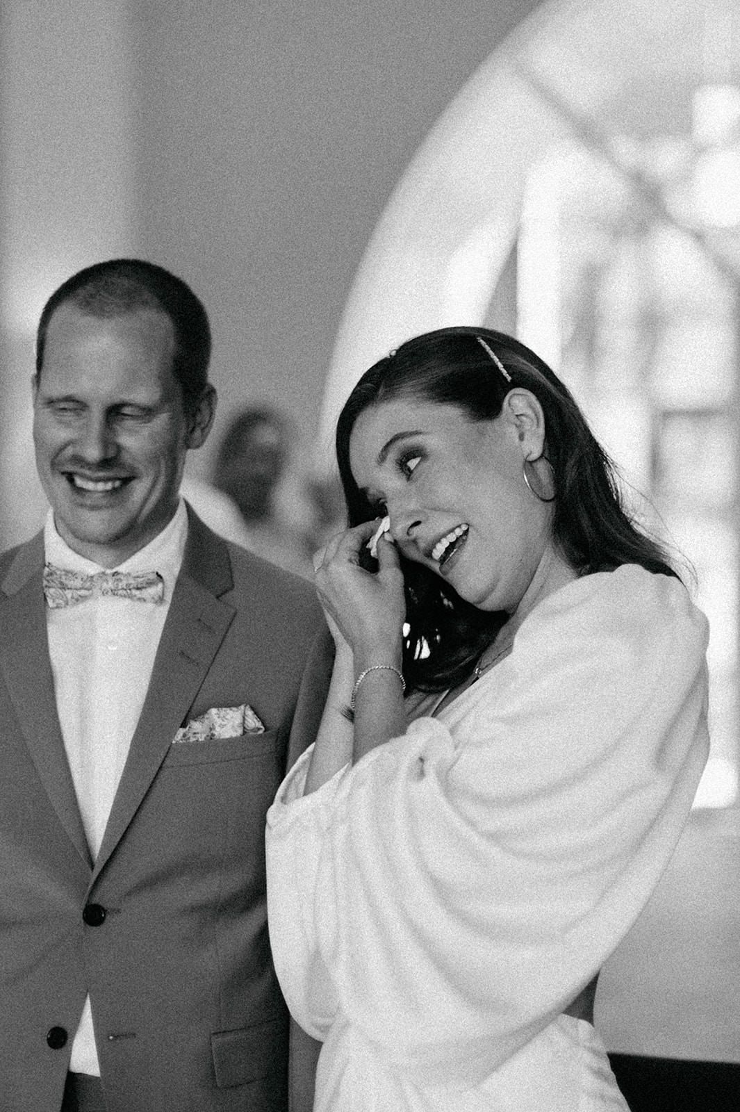 A black and white photo sequence shows a couple sharing playful and romantic moments during their first dance.