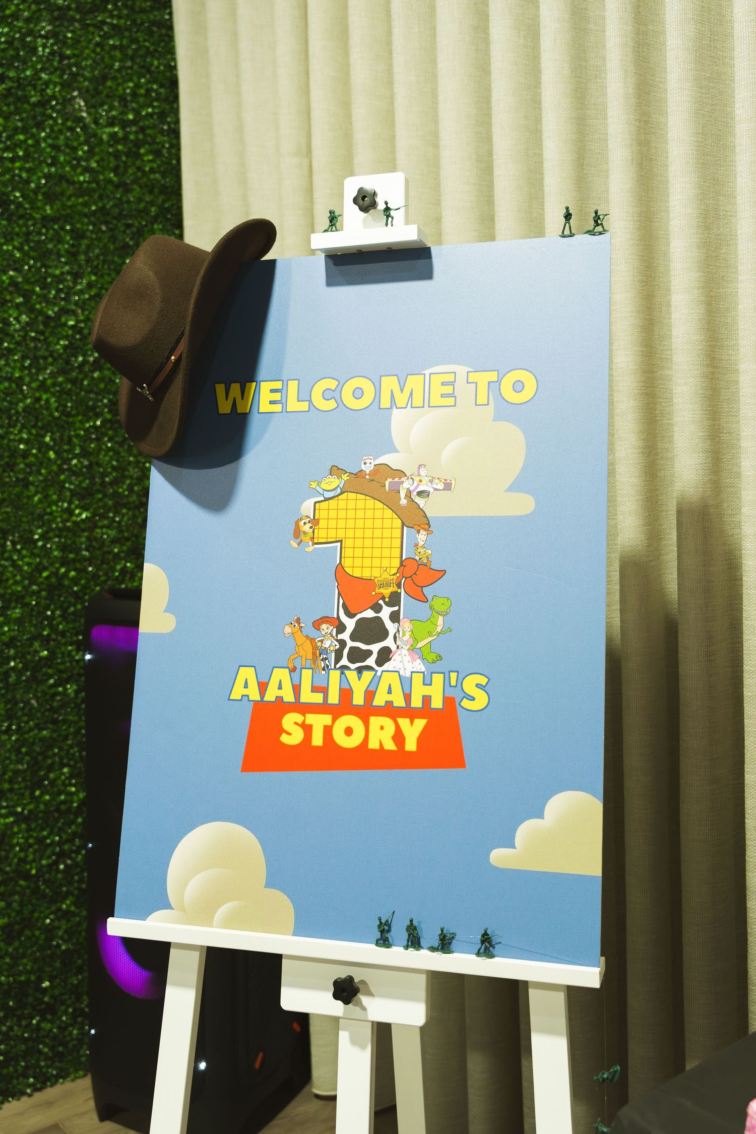 A series of cartoon-themed welcome signs or posters featuring Winnie the Pooh characters against a blue sky background.
