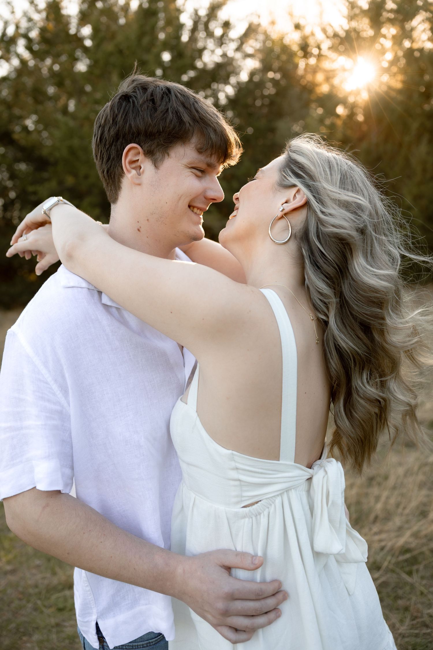 Golden hour couples session, in an open field, Huntsville, Texas by Moments with Merr.