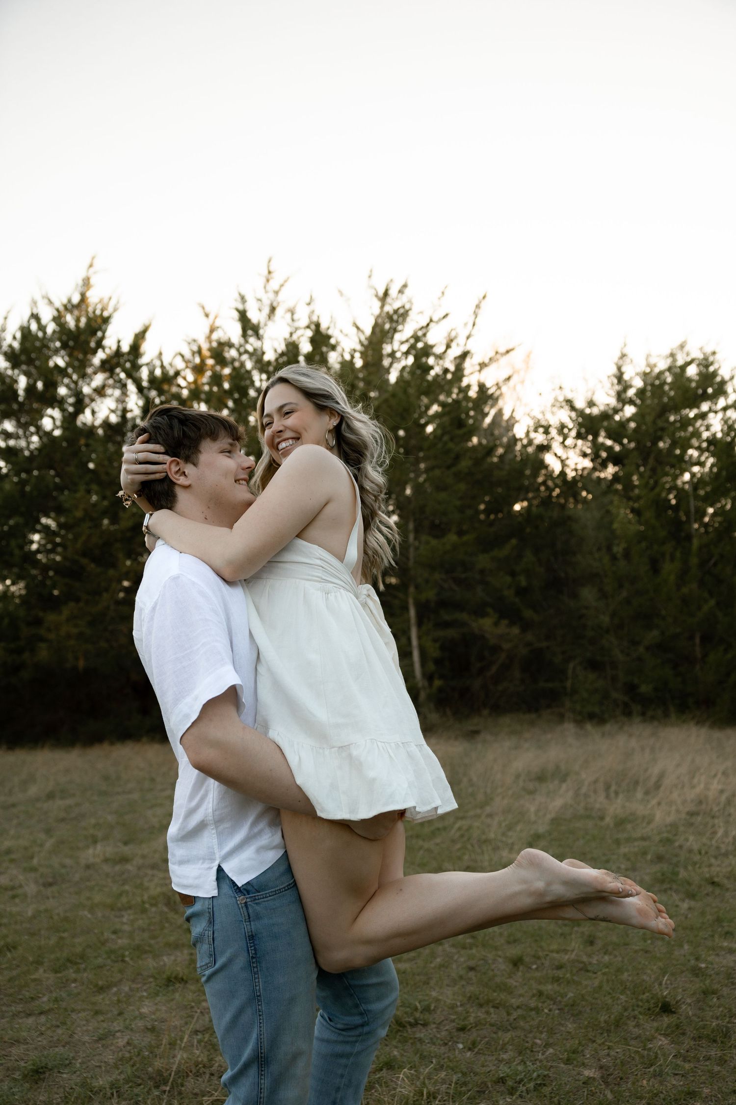 Golden hour couples session, in an open field, Huntsville, Texas by Moments with Merr.