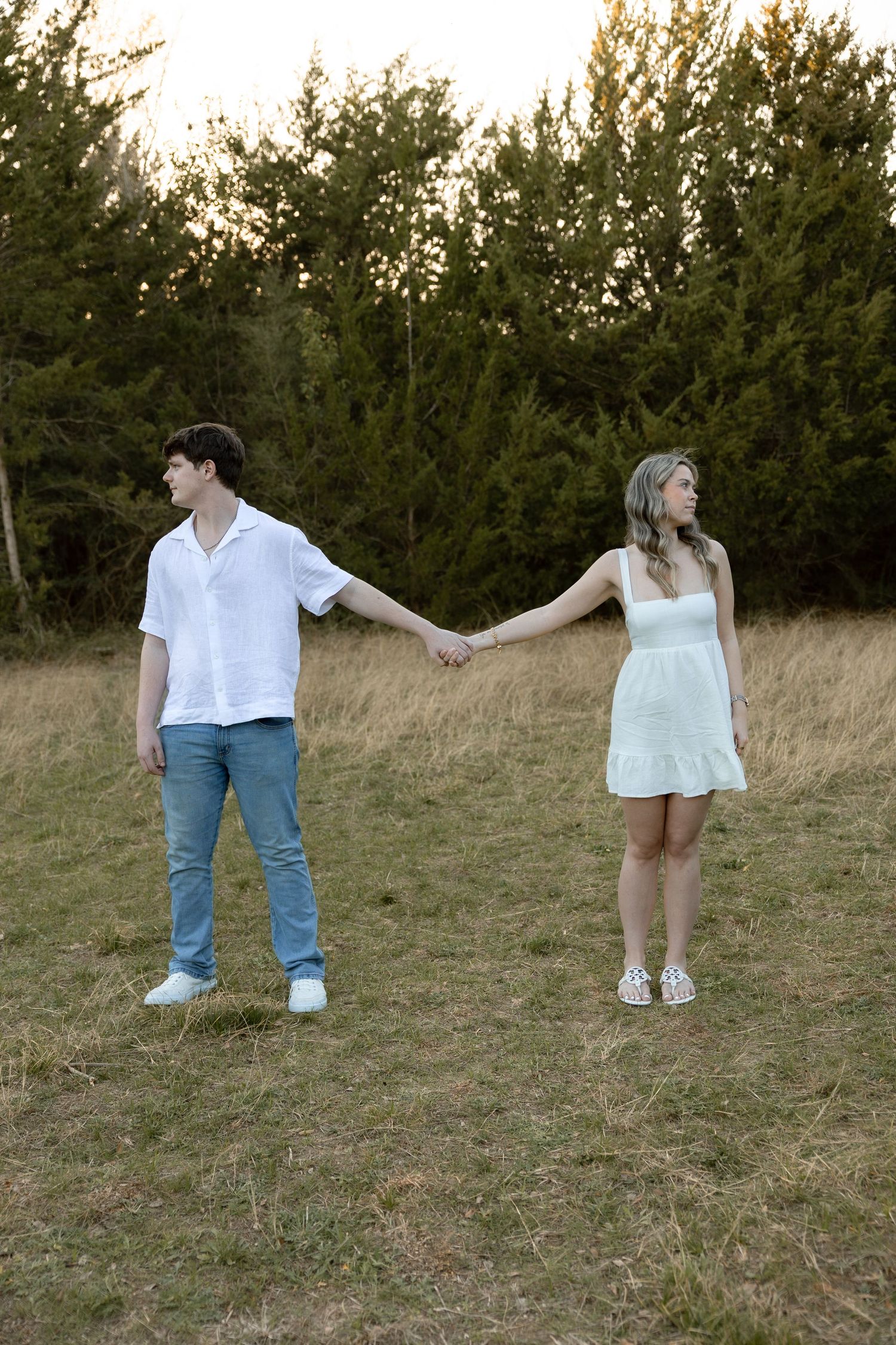 Golden hour couples session, in an open field, Huntsville, Texas by Moments with Merr.