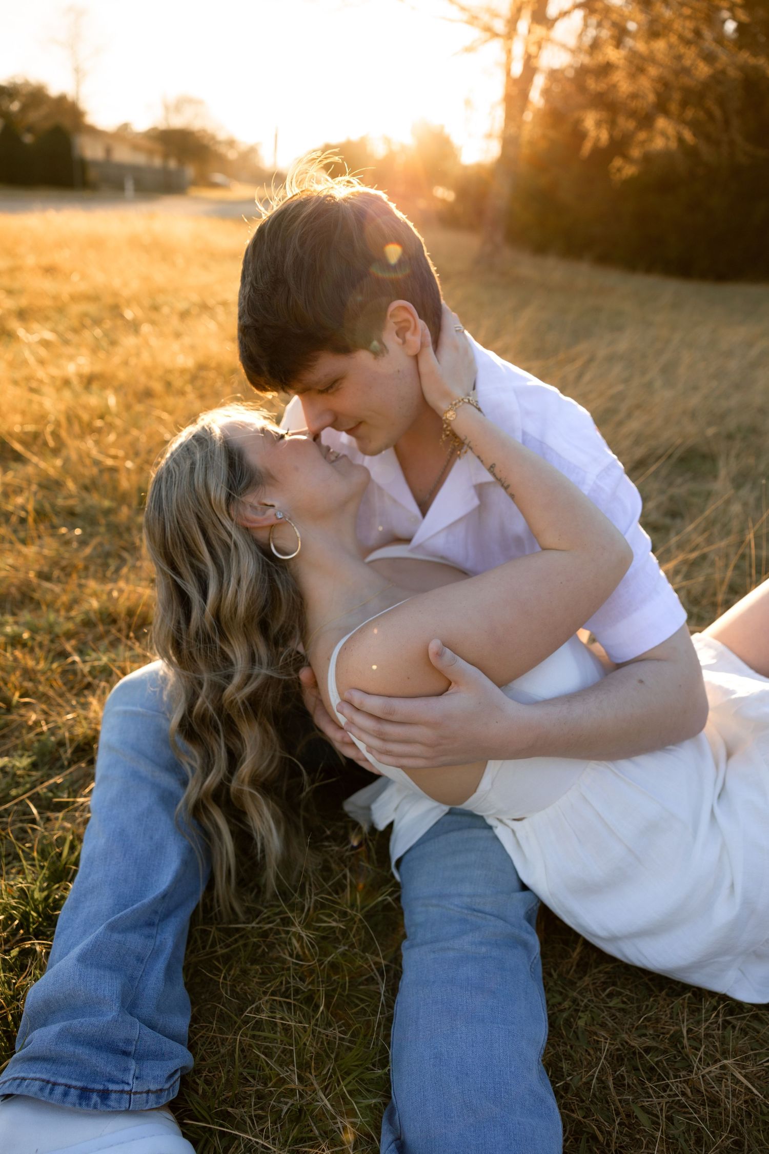 Golden hour couples session, in an open field, Huntsville, Texas by Moments with Merr.