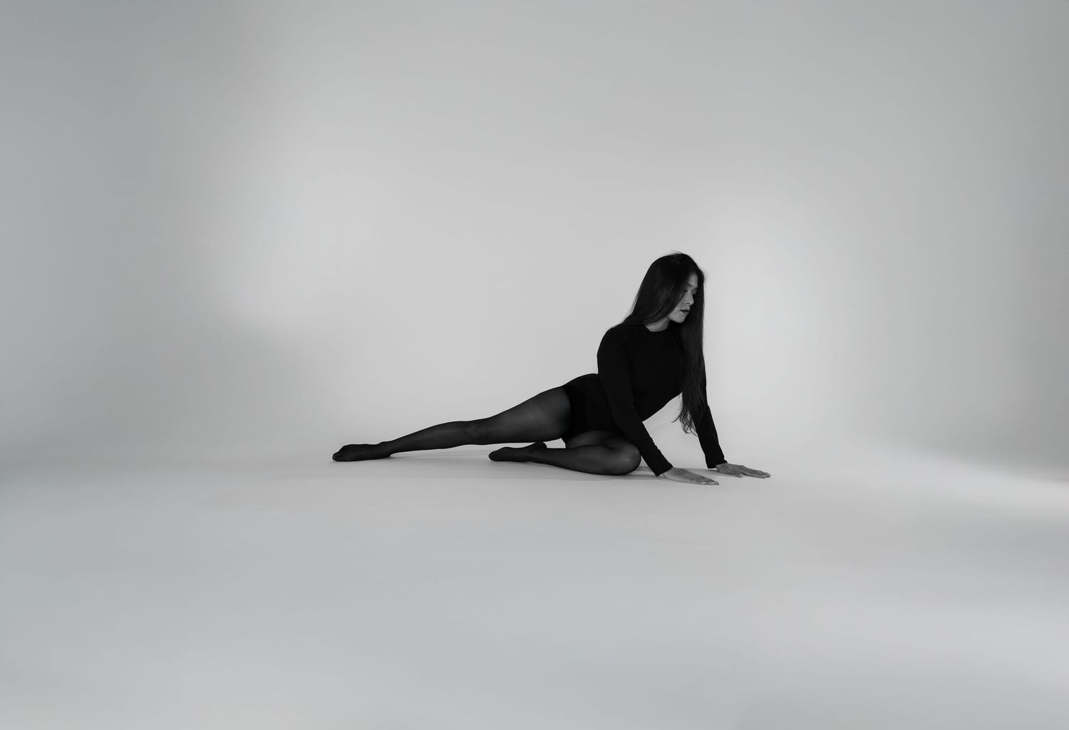 black and white luxury minimalism posing portrait studio style with soft light and shadows
