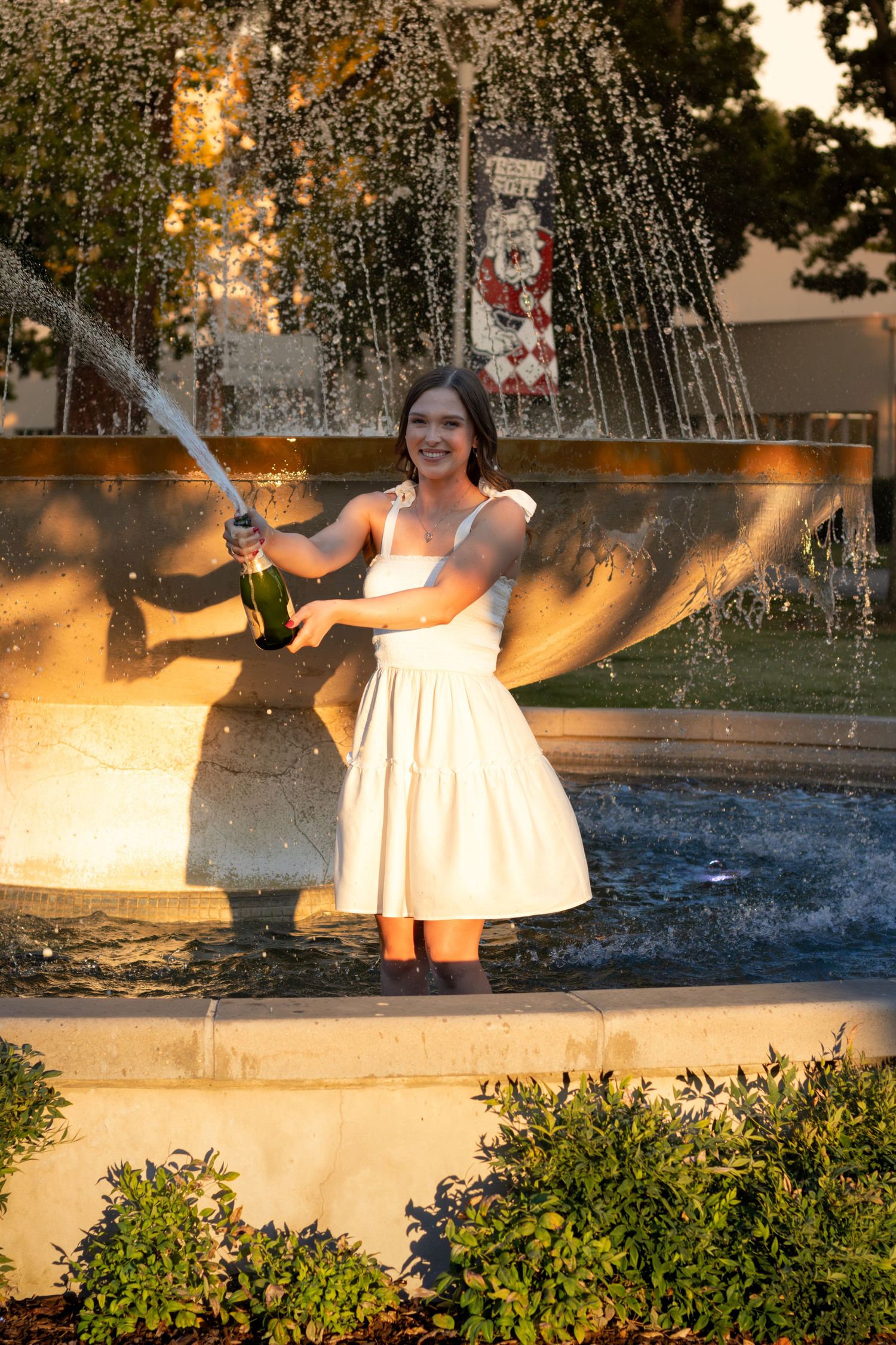 Graduation portrait celebrating Fresno State achievement