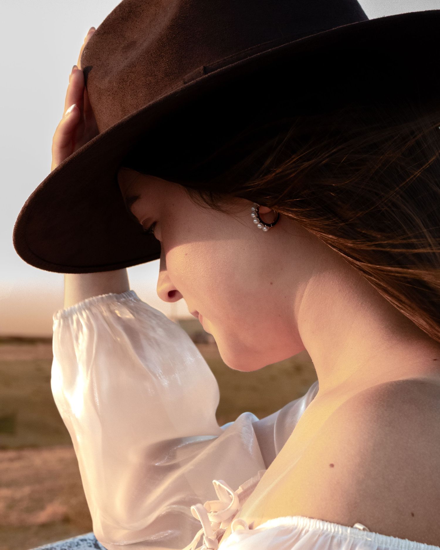 Editorial western inspired elegant portrait outdoors in Fresno