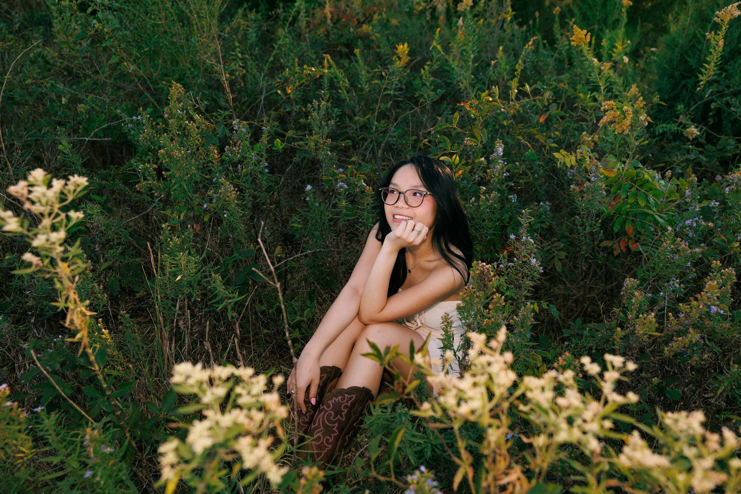 A series of nature-inspired portraits captured in a lush green garden setting.
