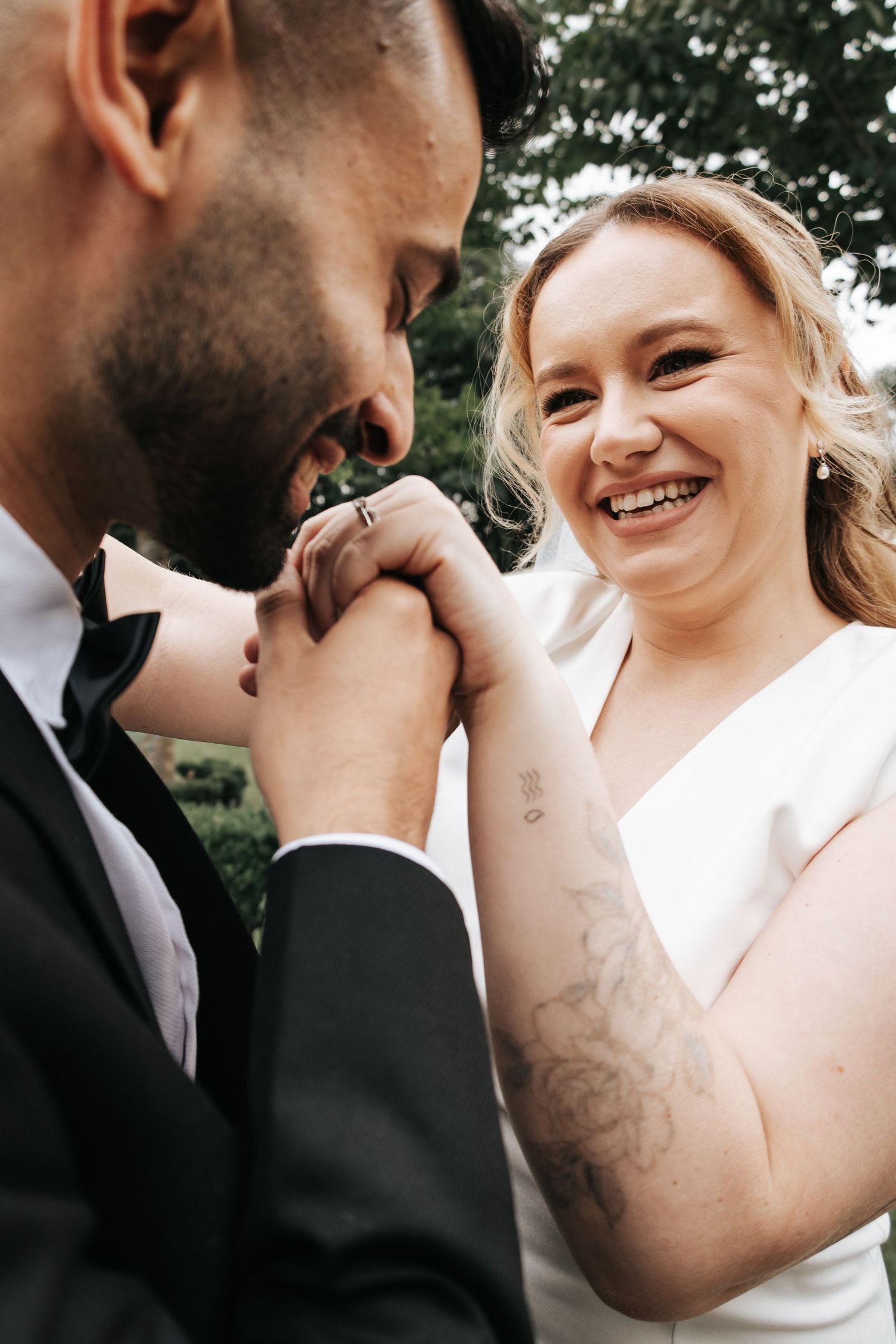 Series of candid wedding moments showing couple sharing laughter and intimate gestures.